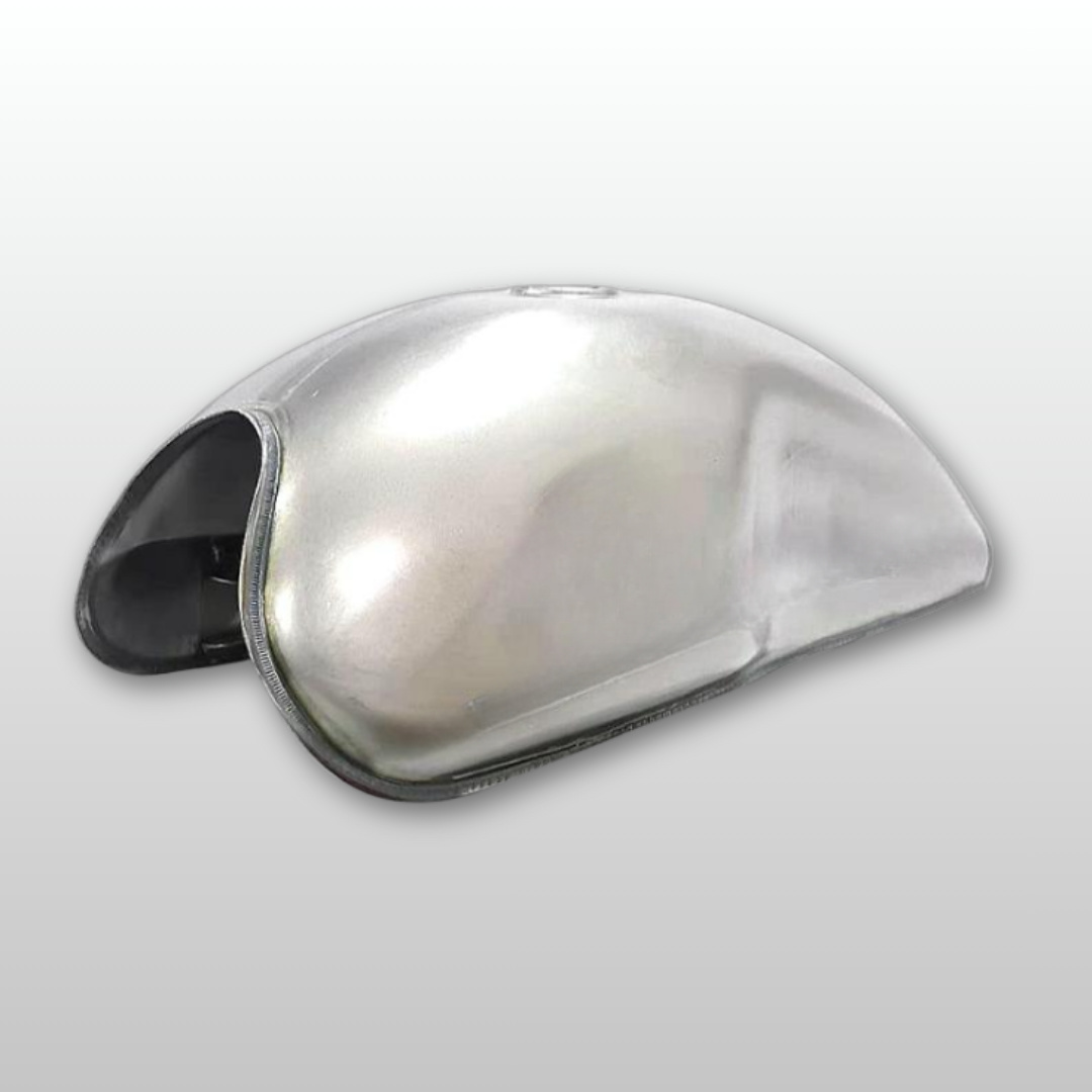 Unpainted gas tank cover on a light gray background