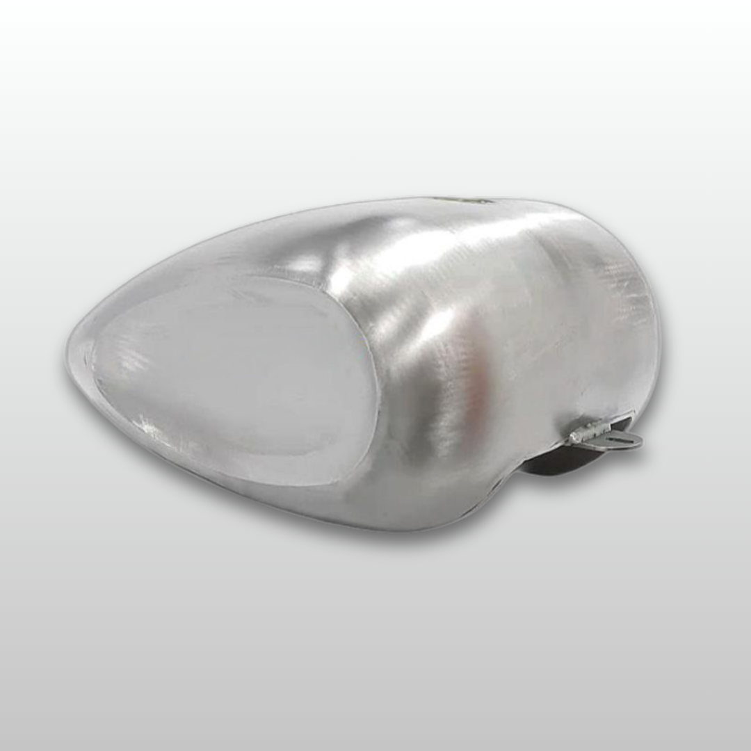 Metallic unpainted dished friscon fuel tank cover on a light gray background
