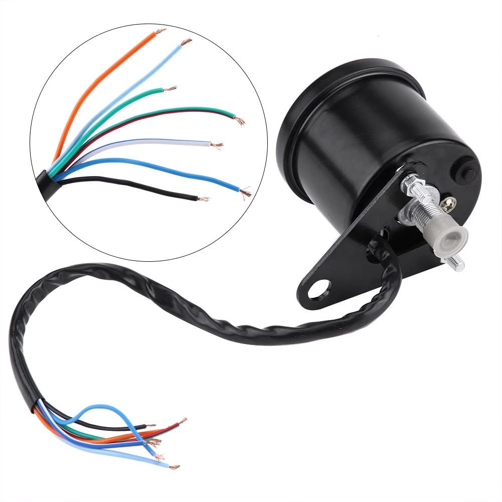Black Speedometer back-view electrical component with wires on a white background