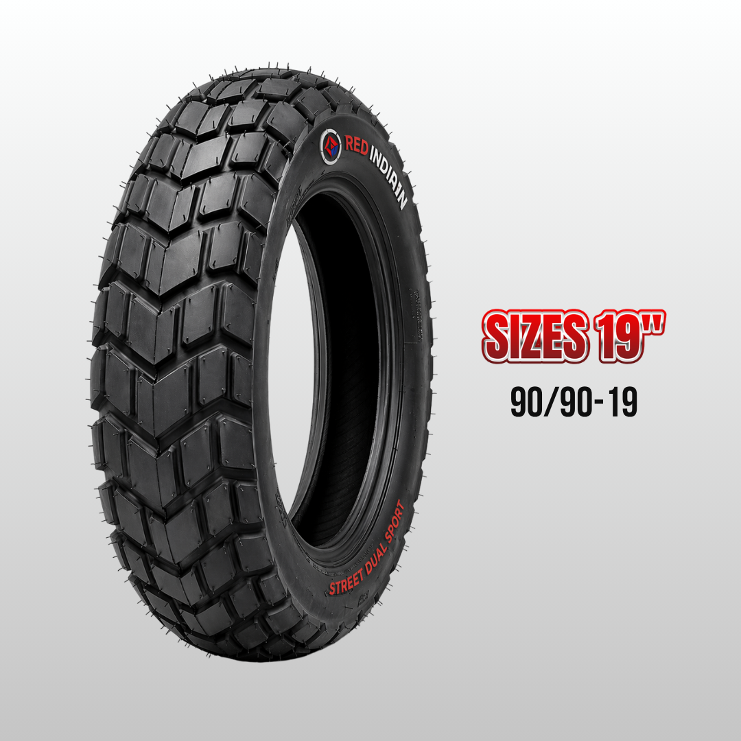 Black tire with red text on a gray background